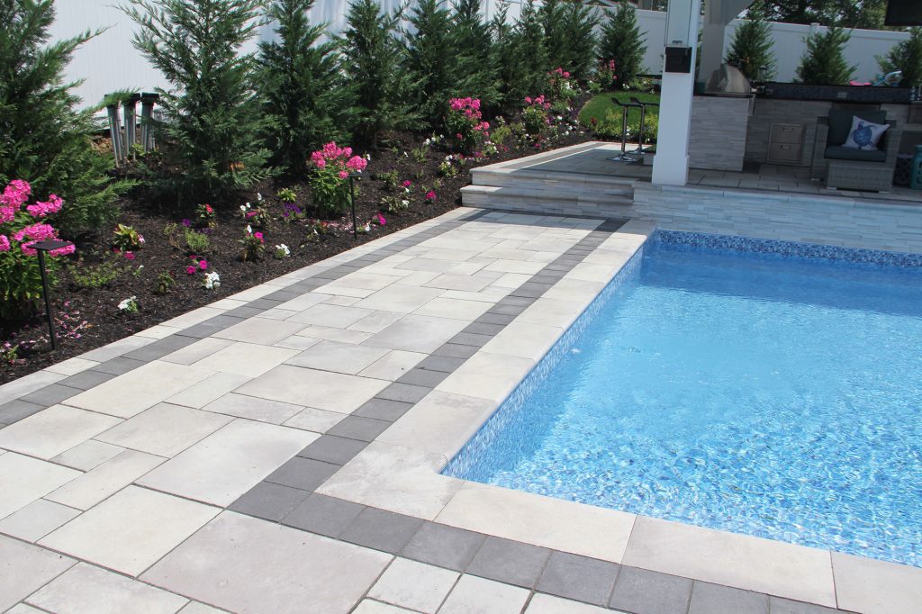 Pavers vs Stamped Concrete: How Weather Affects Long-Term Performance